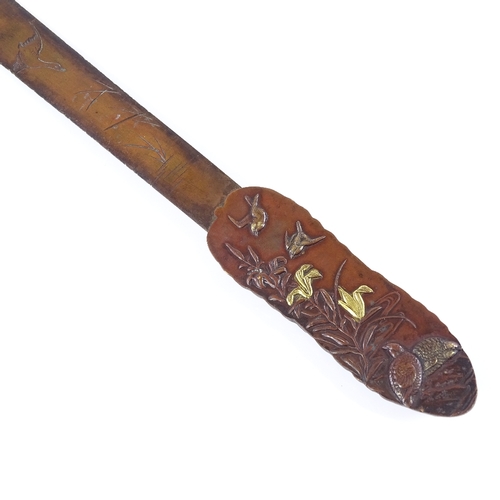 207 - A Japanese Meiji Period paper knife with gilded and patinated handle, depicting birds and insects, l... 