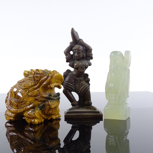 208 - An Indian bronze dancing figure, height 9cm, a Chinese carved jade figure, and a Chinese carved ston... 