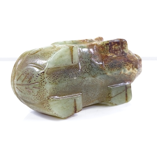 216 - A Chinese carved jade pig, length 9cm