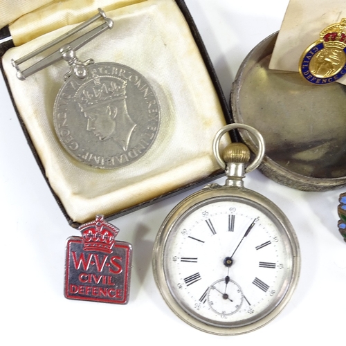 236 - A mixed group of items, including nickel plate pocket watch, enamel badges, Second War Period Genera... 