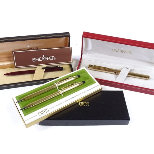 237 - A group of Cross and Sheaffer pens