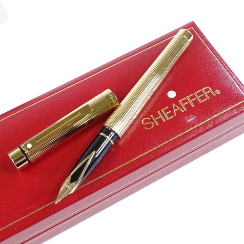 237 - A group of Cross and Sheaffer pens