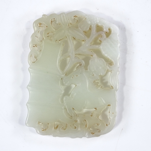 242 - A Chinese carved and pierced jade pendant, length 5cm