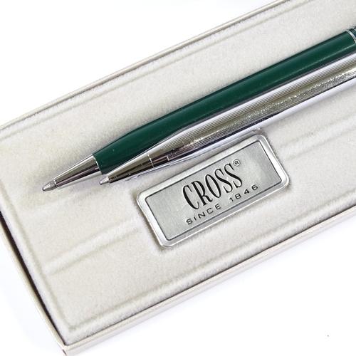 250 - 2 Cross ball pens, 1 in polished stainless steel, the other British racing green, both new and boxed