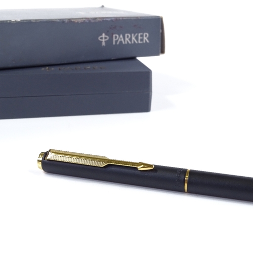 253 - A Parker ballpoint pen, matte black/gold, new and boxed