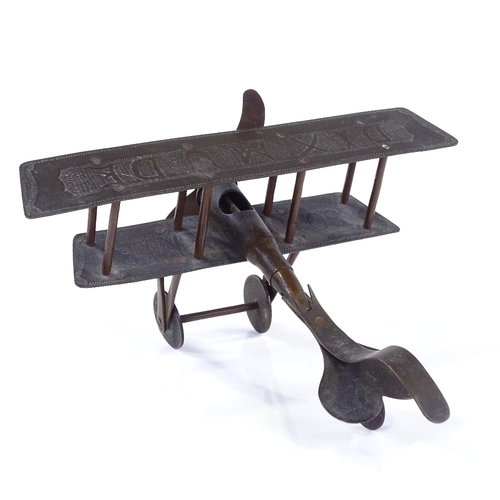 273 - A First War Period trench art bi-plane, inscribed Dixmude, wingspan 16cm