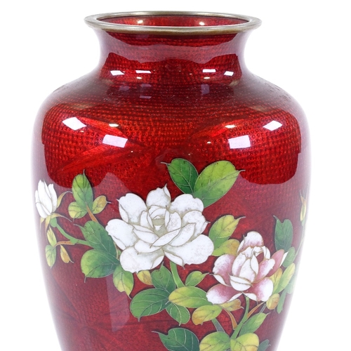 285 - A Japanese red ground cloisonne enamel vase with rose design, signed under the foot, height 18cm