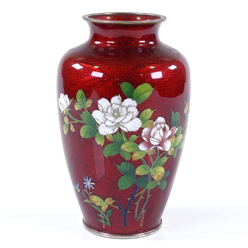 285 - A Japanese red ground cloisonne enamel vase with rose design, signed under the foot, height 18cm