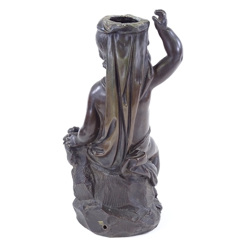 293 - A 19th century patinated bronze cherub design lamp base, height 27cm