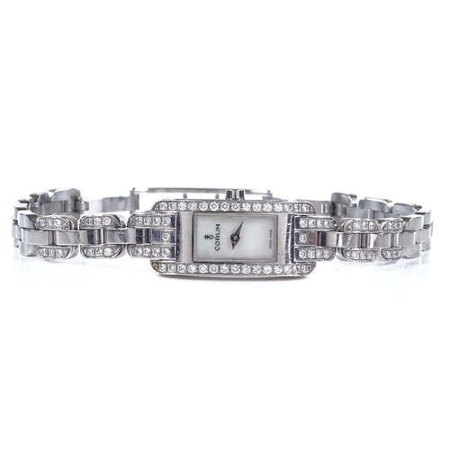 356 - CORUM - a lady's stainless steel Baguette quartz cocktail wristwatch, with diamond set bezel and str... 