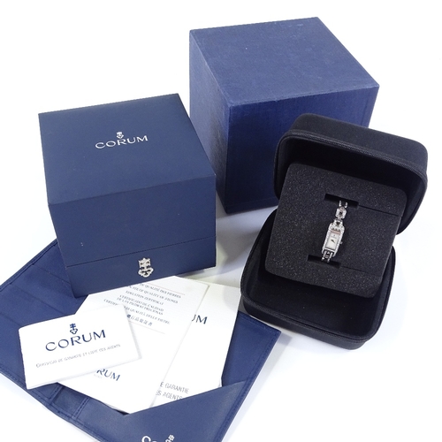 356 - CORUM - a lady's stainless steel Baguette quartz cocktail wristwatch, with diamond set bezel and str... 