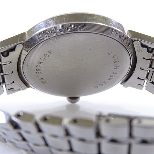 361 - TISSOT - a stainless steel Seastar Seven mechanical wristwatch, silvered dial with baton hour marker... 