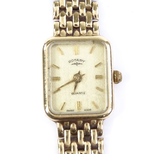 404 - ROTARY - a lady's 9ct gold quartz wristwatch, champagne dial with gilded baton hour markers on 9ct b... 