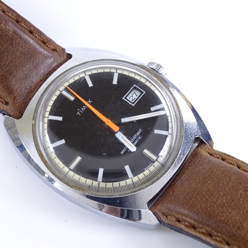 413 - TIMEX - a Vintage stainless steel automatic wristwatch, black dial with baton hour markers and date ... 