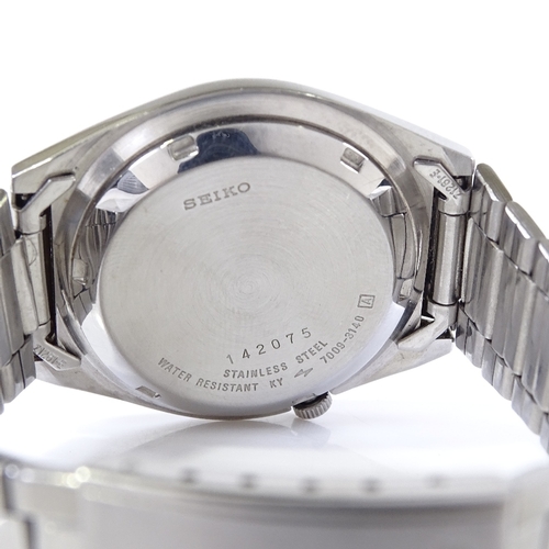 416 - SEIKO 5 - a stainless steel automatic wristwatch, silvered dial with baton hour markers and day date... 