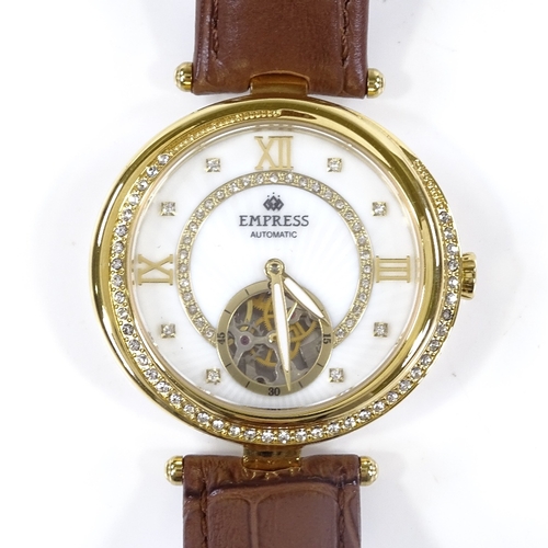 418 - EMPRESS - a lady's gold plated Valois automatic wristwatch, stone set sunburst mother-of-pearl dial ... 