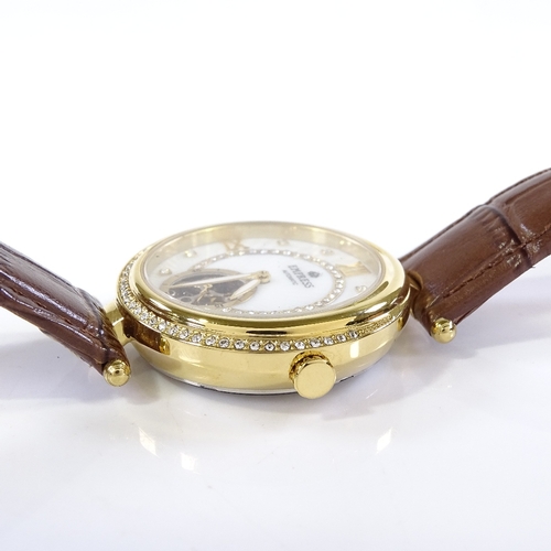 418 - EMPRESS - a lady's gold plated Valois automatic wristwatch, stone set sunburst mother-of-pearl dial ... 