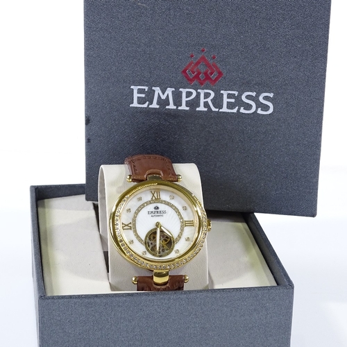 418 - EMPRESS - a lady's gold plated Valois automatic wristwatch, stone set sunburst mother-of-pearl dial ... 