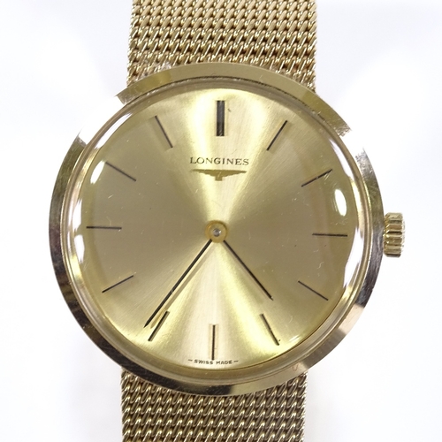 423 - LONGINES - a 9ct gold mechanical wristwatch, champagne dial with baton hour markers and 9ct mesh str... 