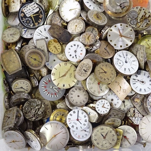 447 - A large collection of various wristwatch movements, including Cyma, Doxa, Bulova etc