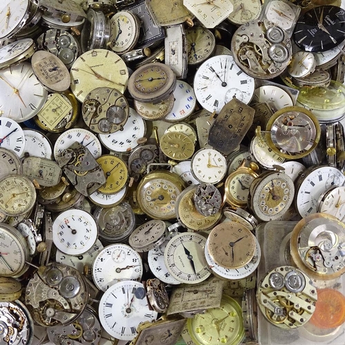 447 - A large collection of various wristwatch movements, including Cyma, Doxa, Bulova etc