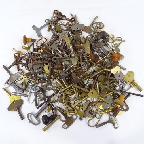 460 - A large quantity of various clock keys, including some with turned wood handles