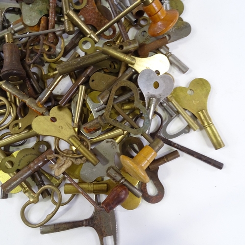 460 - A large quantity of various clock keys, including some with turned wood handles