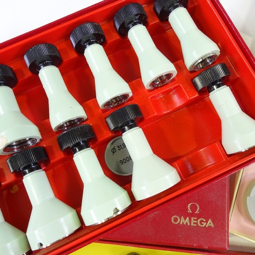 464 - HOROLOGY INTEREST - Omega crystal glass inserting/removing tool set (1 missing), watch holders, and ... 