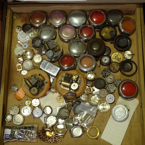 465 - HOROLOGY INTEREST - a large mahogany watchmaker's chest of drawers and contents, including watch mov... 