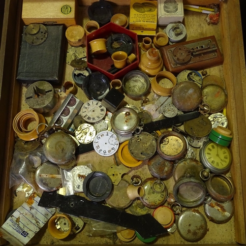 465 - HOROLOGY INTEREST - a large mahogany watchmaker's chest of drawers and contents, including watch mov... 