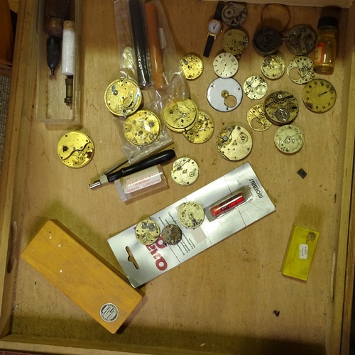 465 - HOROLOGY INTEREST - a large mahogany watchmaker's chest of drawers and contents, including watch mov... 