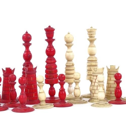 313 - A 19th century red and white stained ivory chess set, King height 10cm, all pieces complete but with... 