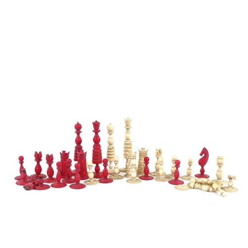 313 - A 19th century red and white stained ivory chess set, King height 10cm, all pieces complete but with... 