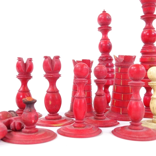 313 - A 19th century red and white stained ivory chess set, King height 10cm, all pieces complete but with... 