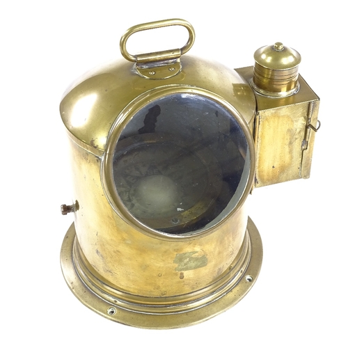 318 - A 19th century ship's brass binnacle containing a gimballed compass, height excluding handle 23cm