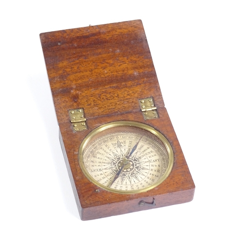 319 - An 18th century mahogany-cased and brass-mounted compass, case width 8cm