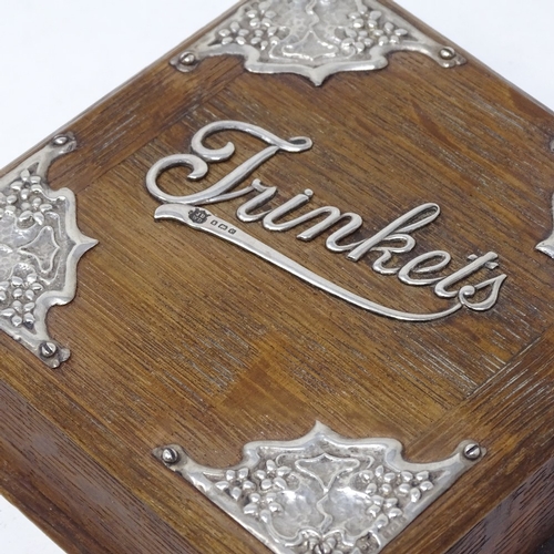 821 - An Edwardian silver-mounted oak jewellery trinkets box, by Jame Deakin & Sons, hallmarks Birmingham ... 