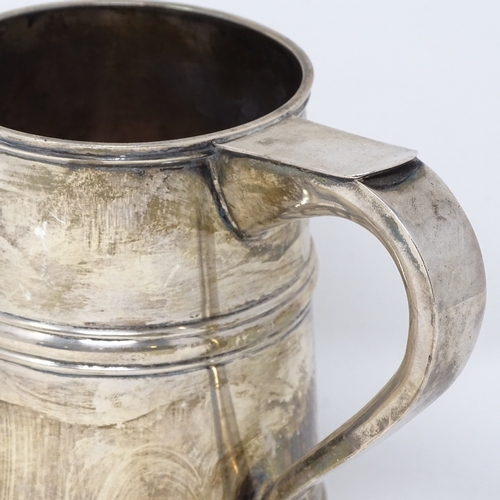 824 - A George V silver pint mug, of tapered form, with banded body, by Harrods Ltd, hallmarks London 1924... 