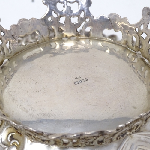 841 - A Victorian silver bon bon dish, with relief embossed ribbon and floral decoration, by Levi & Salama... 