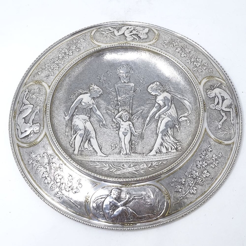 849 - A Victorian silver and parcel gilt plaque, depicting relief embossed Classical scene with cherub and... 