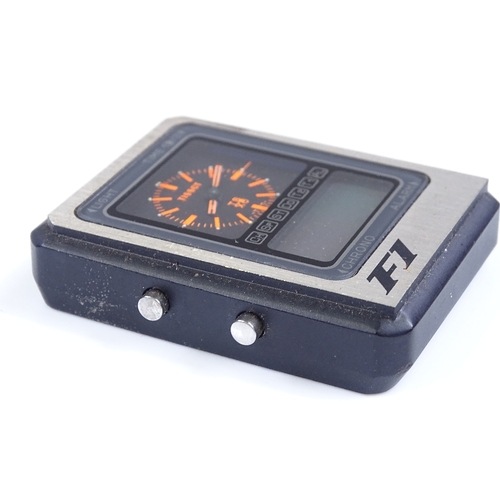 375 - TISSOT - a TSX6 F1 travel desk alarm clock, quartz movement, height 45mm, not seen working