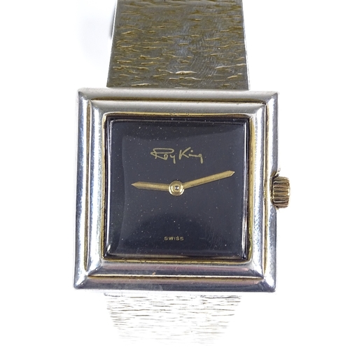 377 - ROY KING - a sterling silver designer mechanical bangle wristwatch, black dial with square stepped c... 