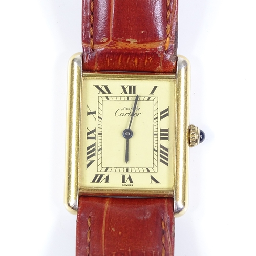 378 - CARTIER - a lady's silver-gilt Vermeil Tank quartz wristwatch, champagne dial with Roman numeral hou... 