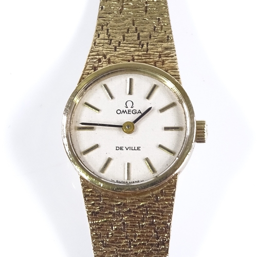 388 - OMEGA - a lady's 9ct gold De Ville mechanical cocktail wristwatch, silvered dial with baton hour mar... 