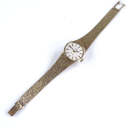 388 - OMEGA - a lady's 9ct gold De Ville mechanical cocktail wristwatch, silvered dial with baton hour mar... 