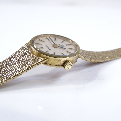 388 - OMEGA - a lady's 9ct gold De Ville mechanical cocktail wristwatch, silvered dial with baton hour mar... 