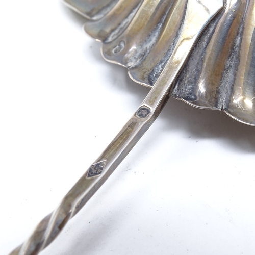 850 - A French silver toddy ladle, with twisted whale-bone handle, length 38cm