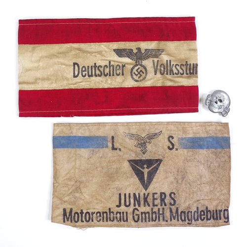 325 - 2 German Junkers and Volkstrun armbands, and a metal badge (3)