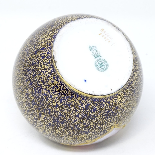 310 - Robert Allen Studios for Royal Doulton, small globular vase with hand painted scene in blue and gold... 