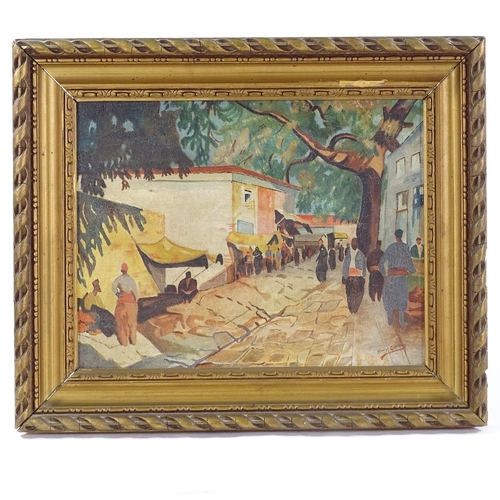 1192 - Mid-20th century oil on canvas, North African street scene, indistinctly signed, 10.5